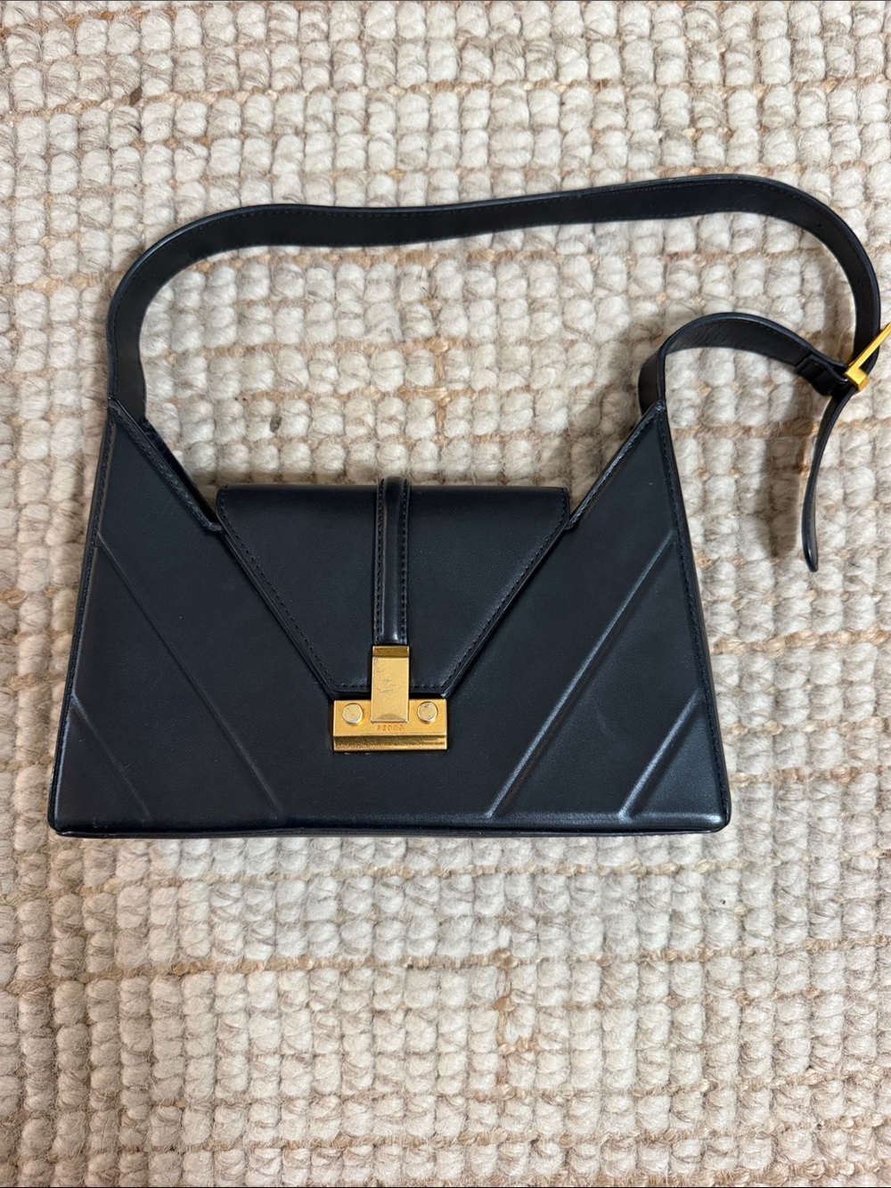 Sleek Black Leather Shoulder Bag with Gold-Tone Lock